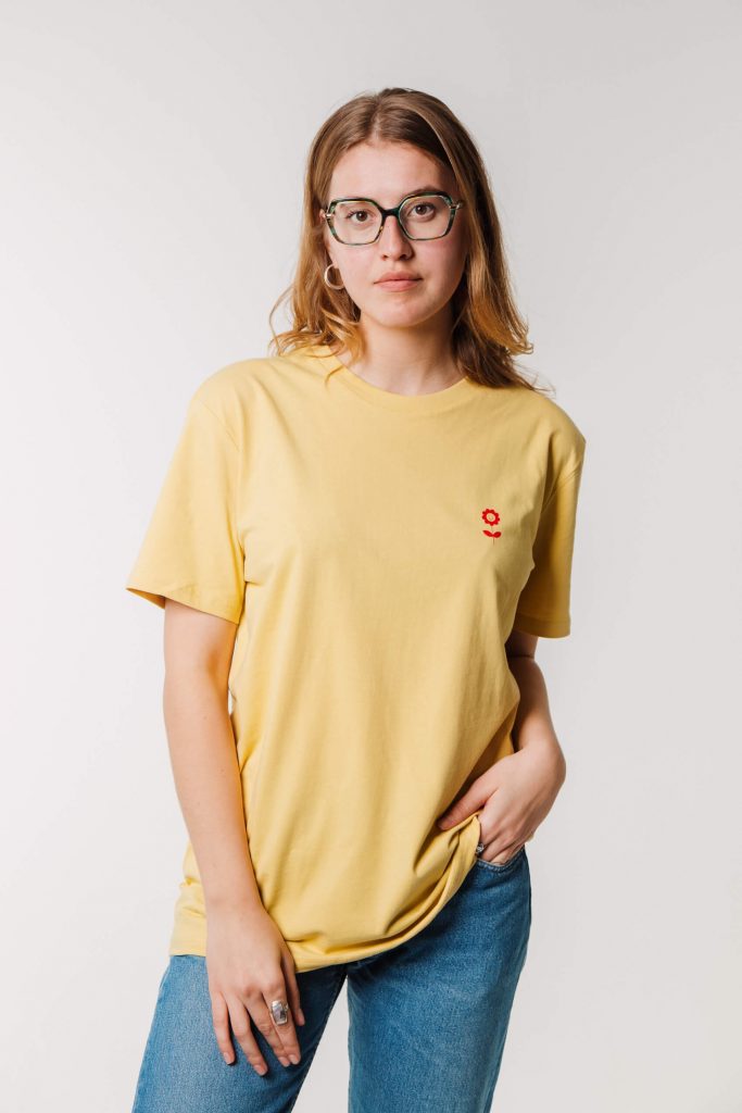Vaira Vīksne Unisex Organic Cotton T-shirt "Dzīvot skaisti" Jojoba