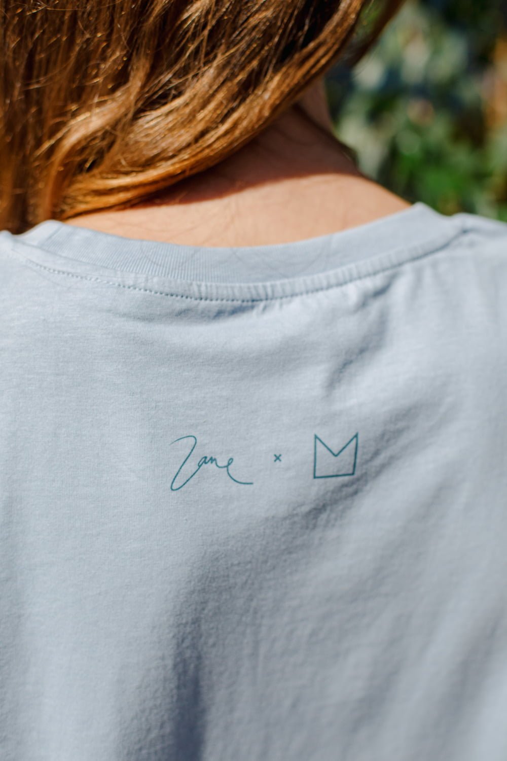 M50 x Zane Veldre Organic cotton Women's Rolled Sleeve T-shirt Crane I Serene Blue