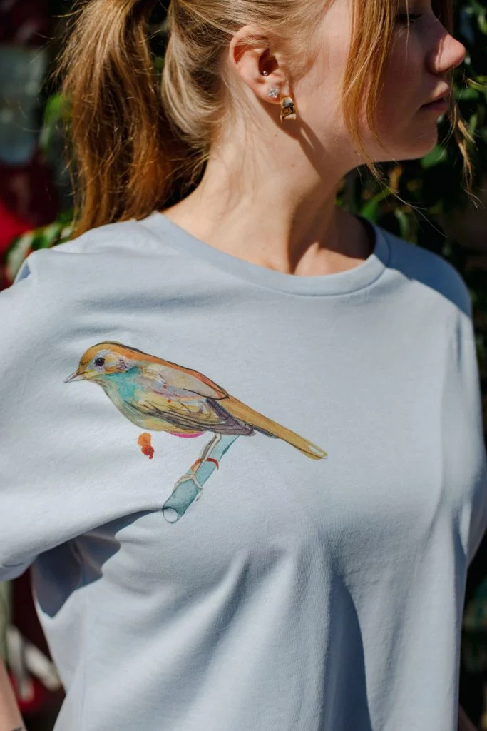 M50 x Zane Veldre Organic cotton Women's Rolled Sleeve T-shirt Nightingale I Serene Blue