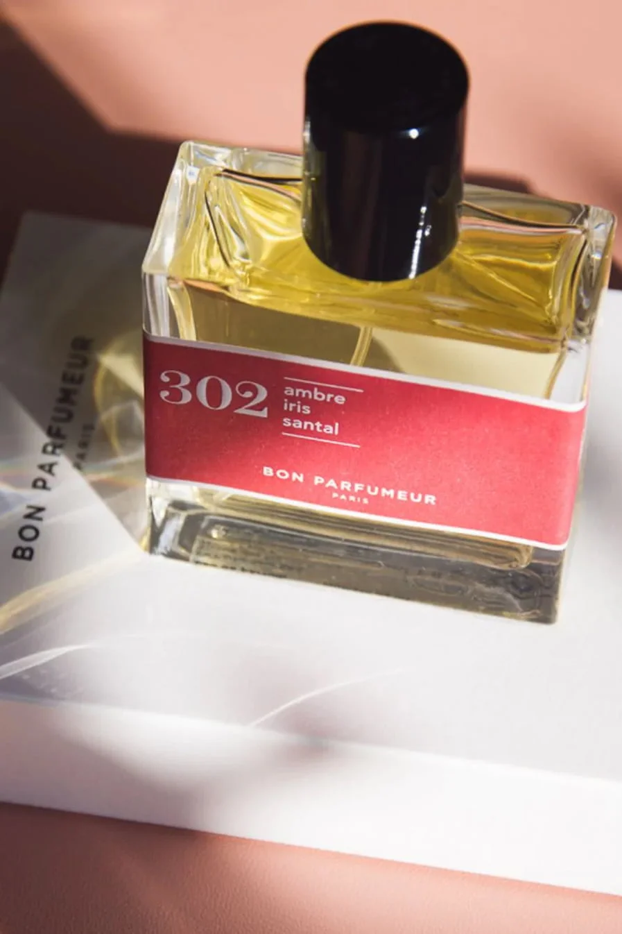 Eau de parfum 302 : dzintars, īriss, sandalkoks