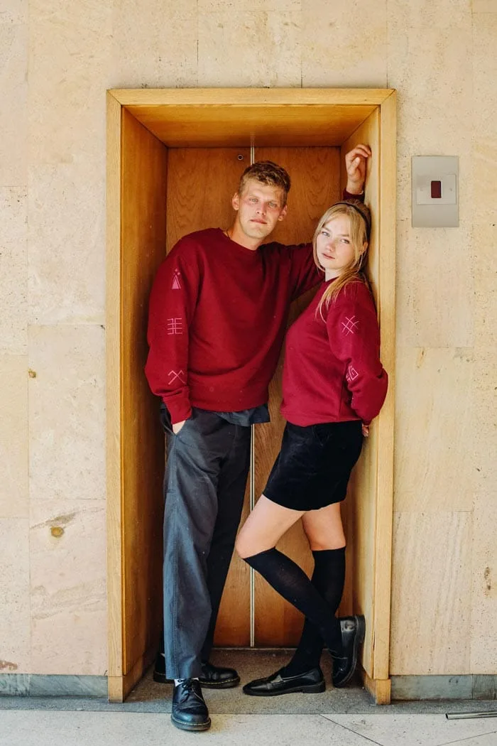 M50 Unisex Relaxed Fit Sweatshirt With Latvian Signs | Burgundy