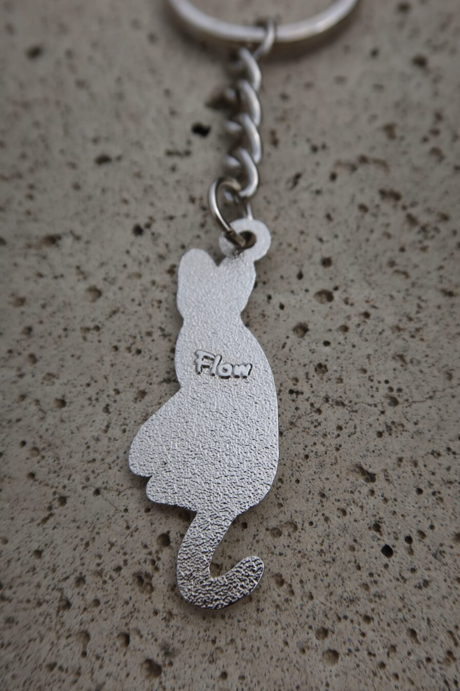 FLOW key fob - official merch for the film